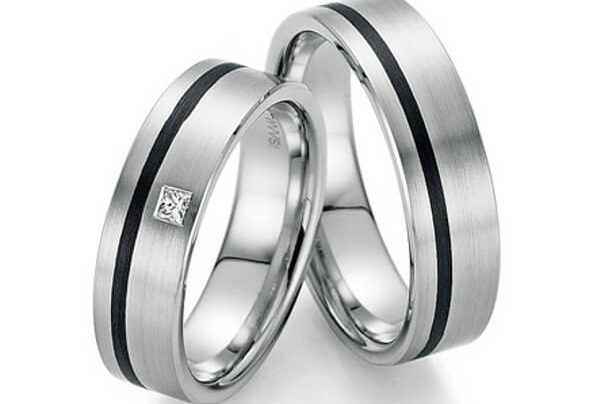 Silver wedding rings with a black stripe