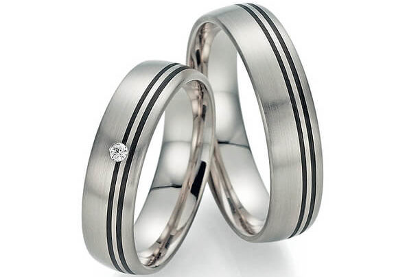 Silver rings with black stripes