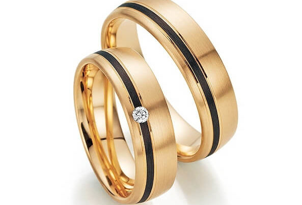 Gold and black wedding rings