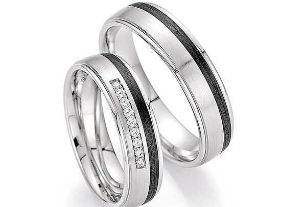 Silver wedding rings with a black stripe