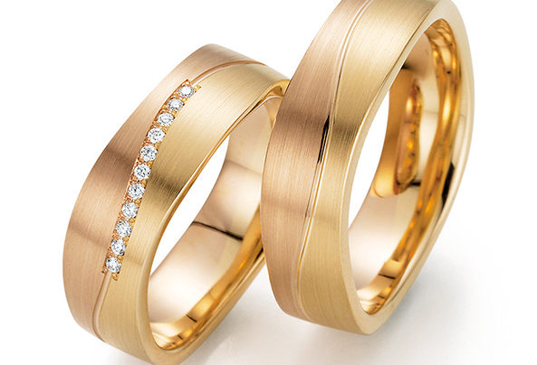 Curved matt gold wedding rings