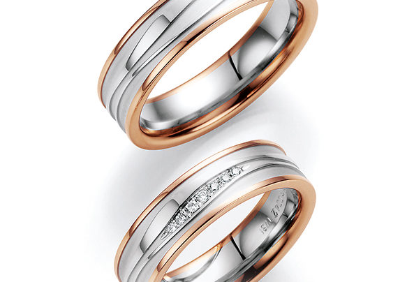 Silver wedding rings with rose gold rim