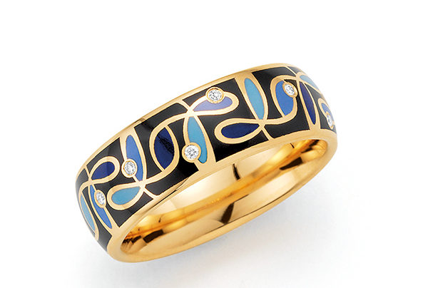 Golden ring with black and gold pattern