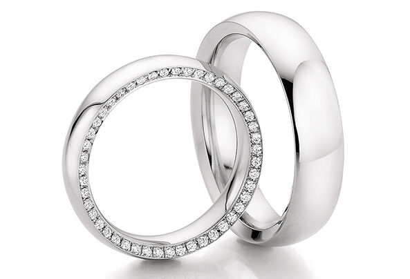 Simple white gold wedding rings with diamonds