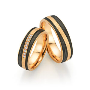 Apricot gold wedding rings with carbon