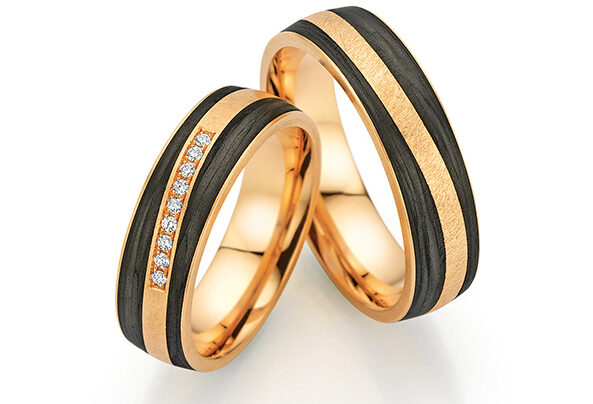 Apricot gold wedding rings with carbon